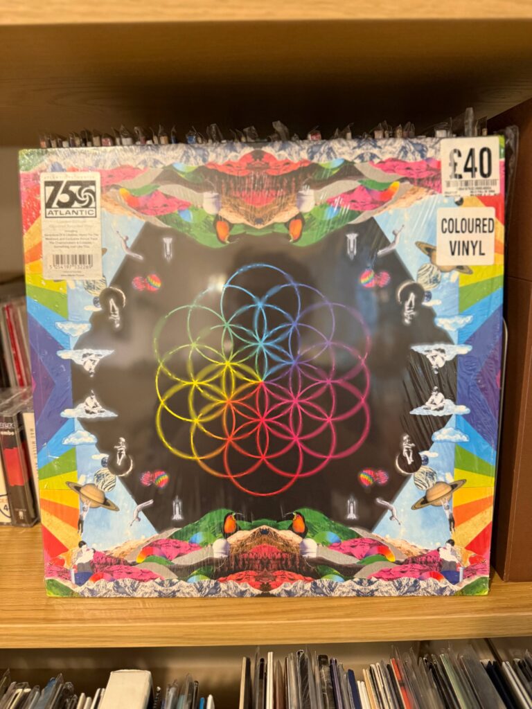 Coldplay - A Head Full of Dreams vinyl record with colorful jacket
