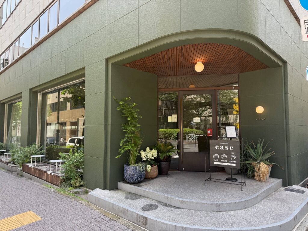 Stylish green exterior and entrance of Patisserie ease in Nihonbashi