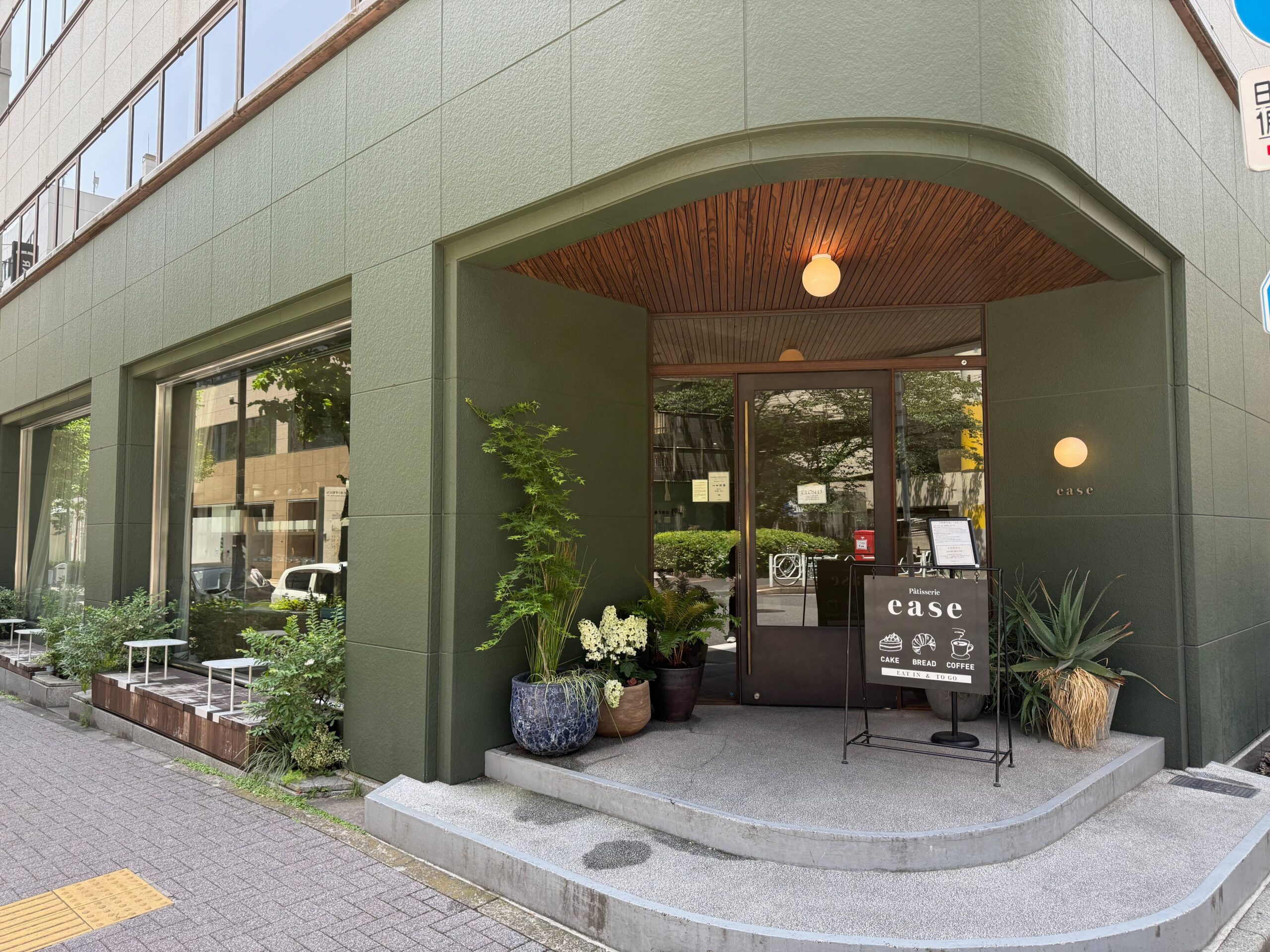 Stylish green exterior and entrance of Patisserie ease in Nihonbashi