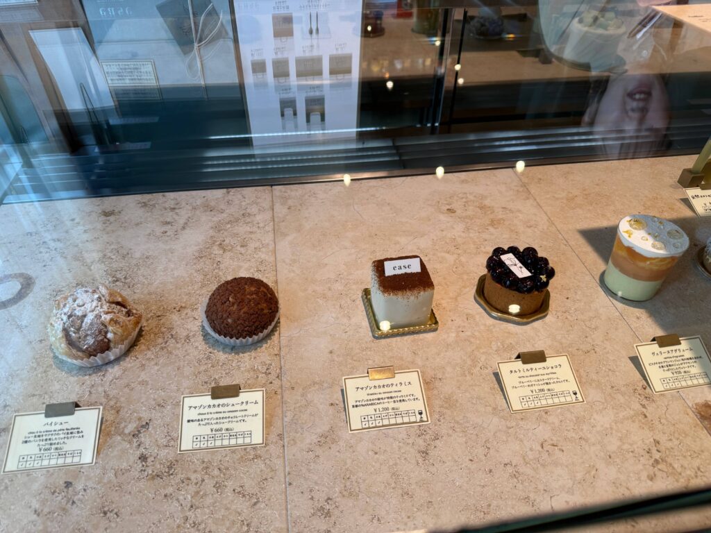 Patisserie ease cake showcase featuring Amazon Cacao Tiramisu and other cakes
