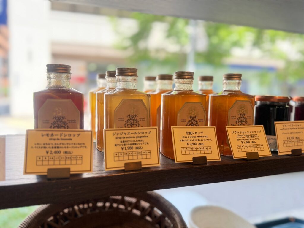 Homemade syrups and jams in stylish bottles at Patisserie ease