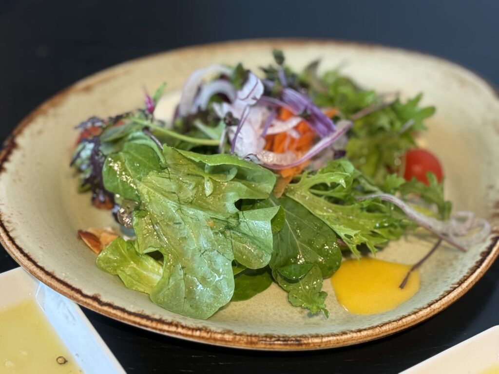 Lunch set salad with two types of dressing.