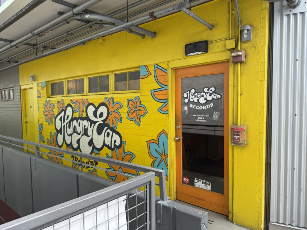 The exterior of a record store with the words 