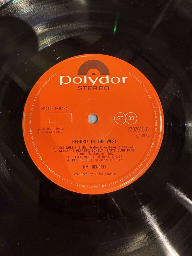 A close-up of the vinyl record for Jimi Hendrix's album 