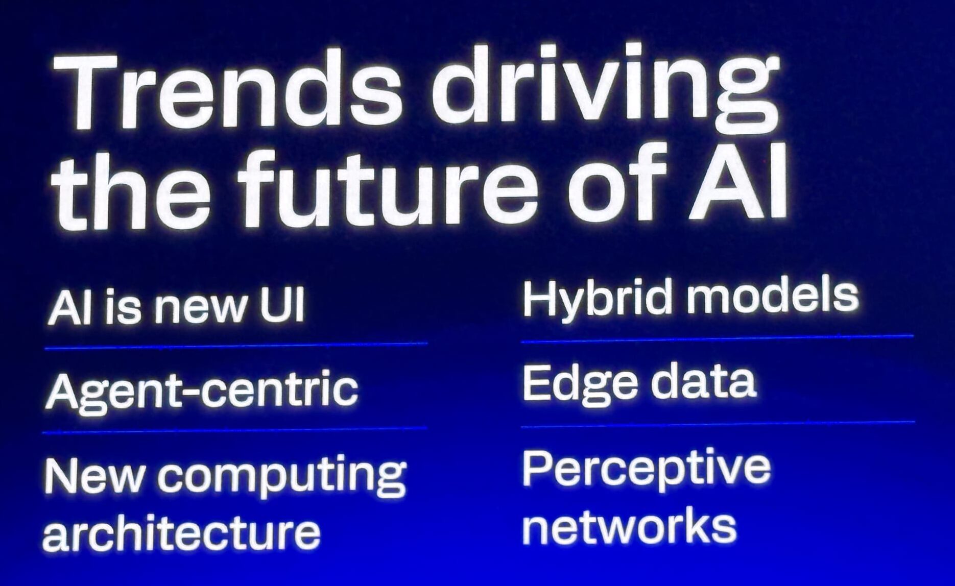 Presentation slide titled 'Trends driving the future of AI' listing six points: AI is new UI, Agent-centric, New computing architecture, Hybrid models, Edge data, and Perceptive networks.