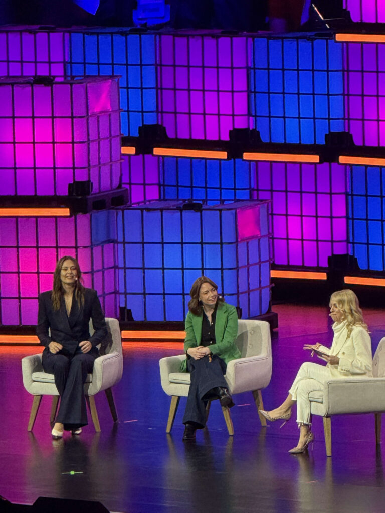 Maria Sharapova and panelists sitting on stage chairs during a session about IBM and AI initiatives