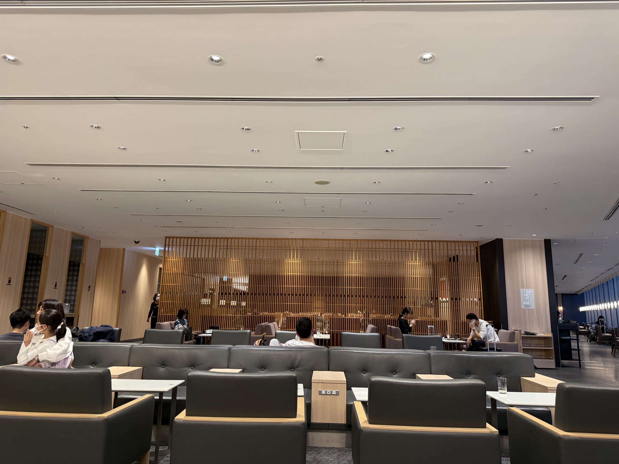 People relaxing in a quiet airport lounge.