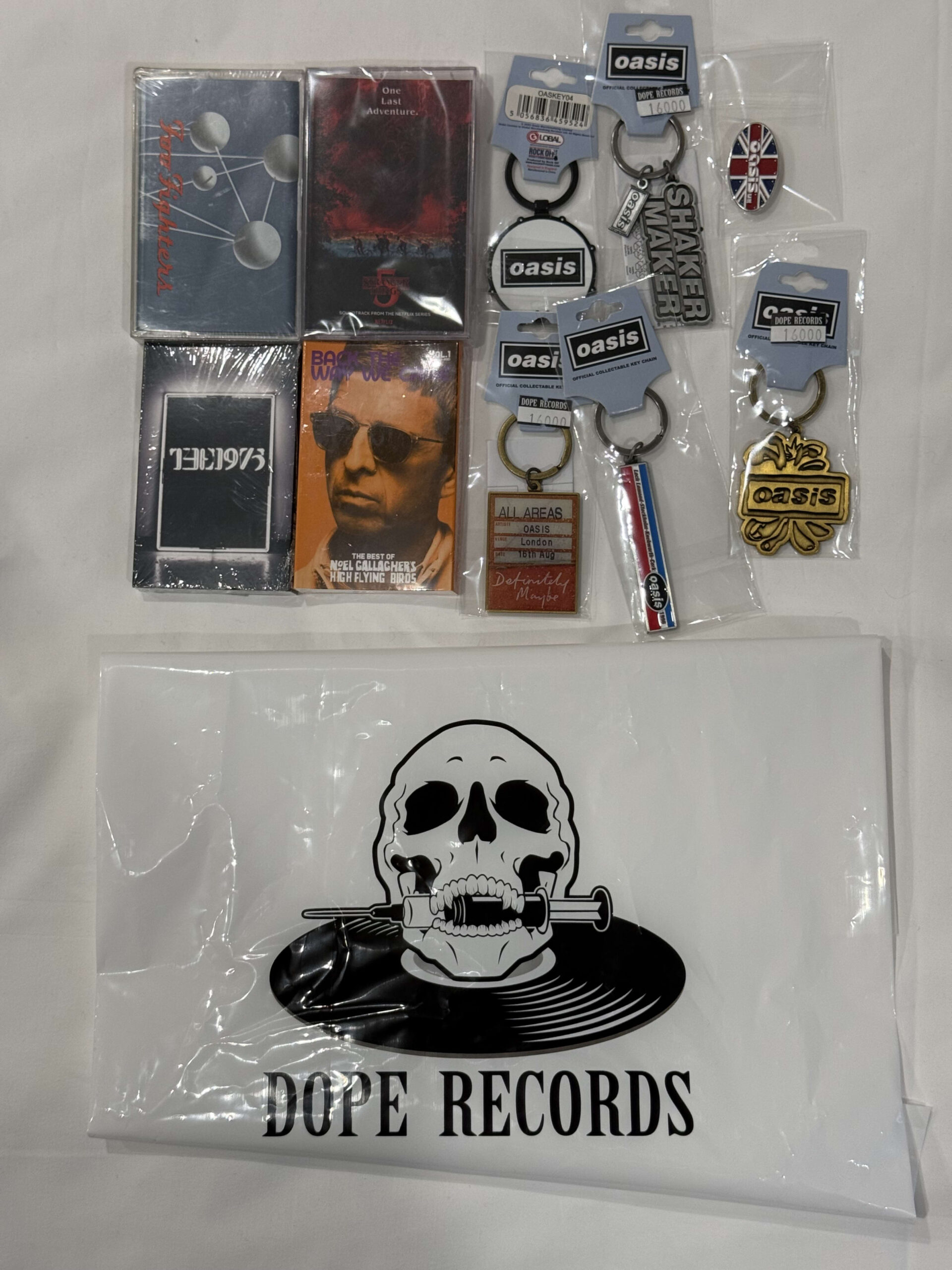 The massive cassette tape wall and rare Oasis merchandise at DOPE RECORDS in Mapo, Seoul