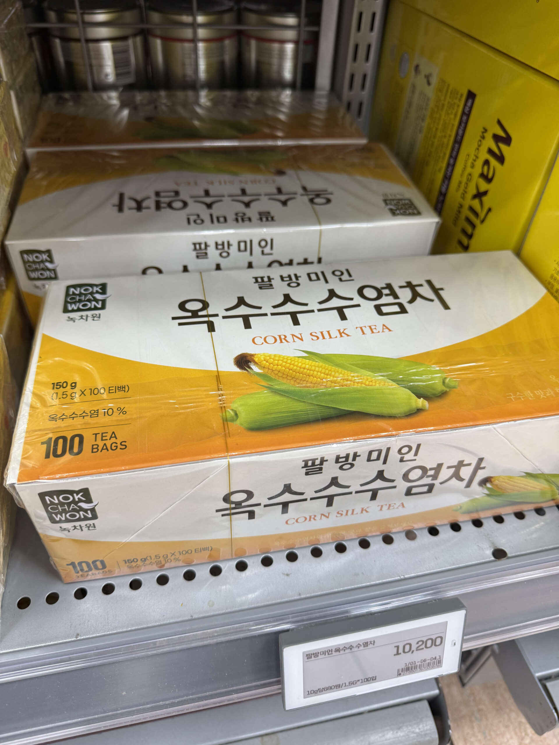 100-pack box of corn silk tea on a supermarket shelf.