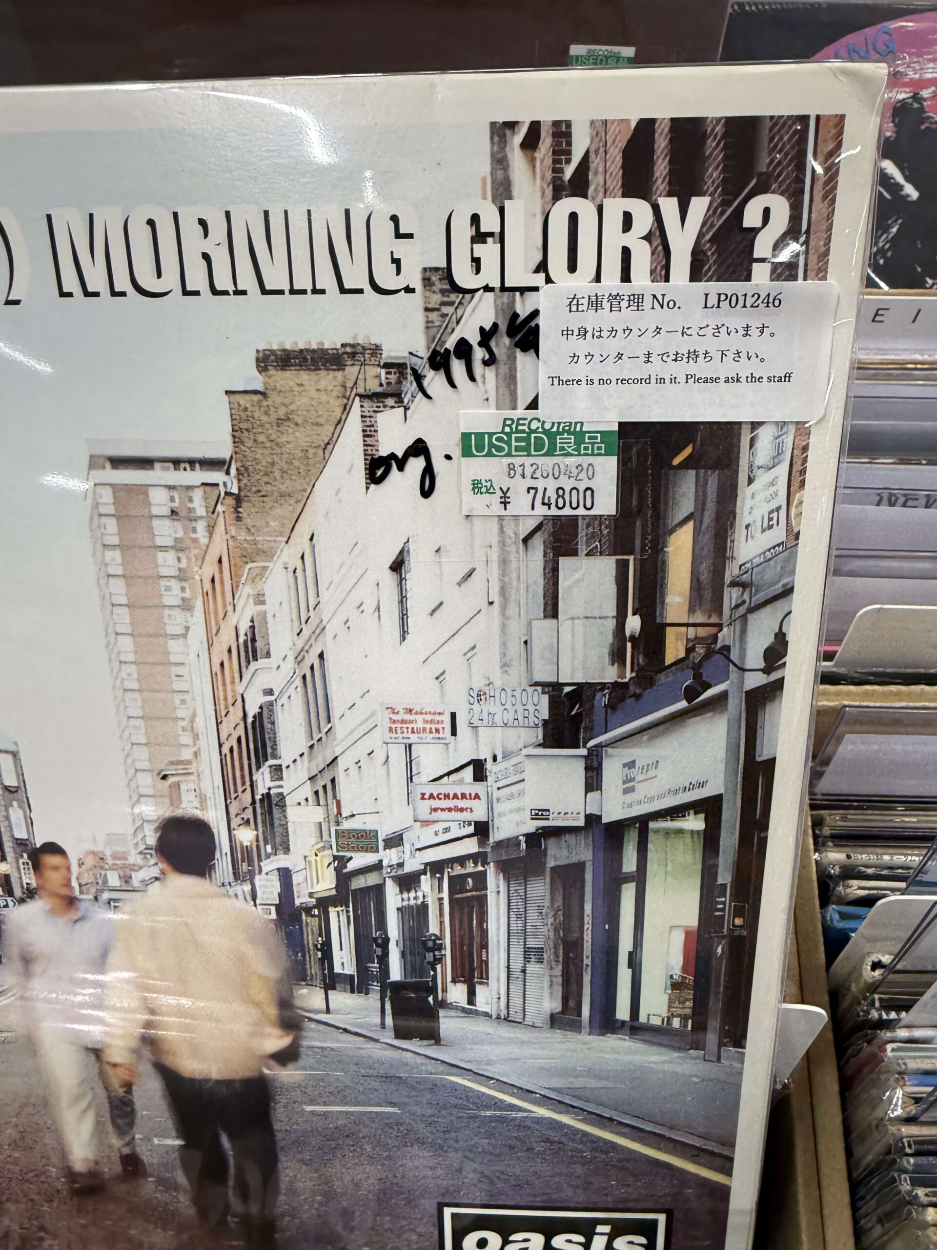 Oasisのレコード。7万4800円の値札と「org.」の文字がある。