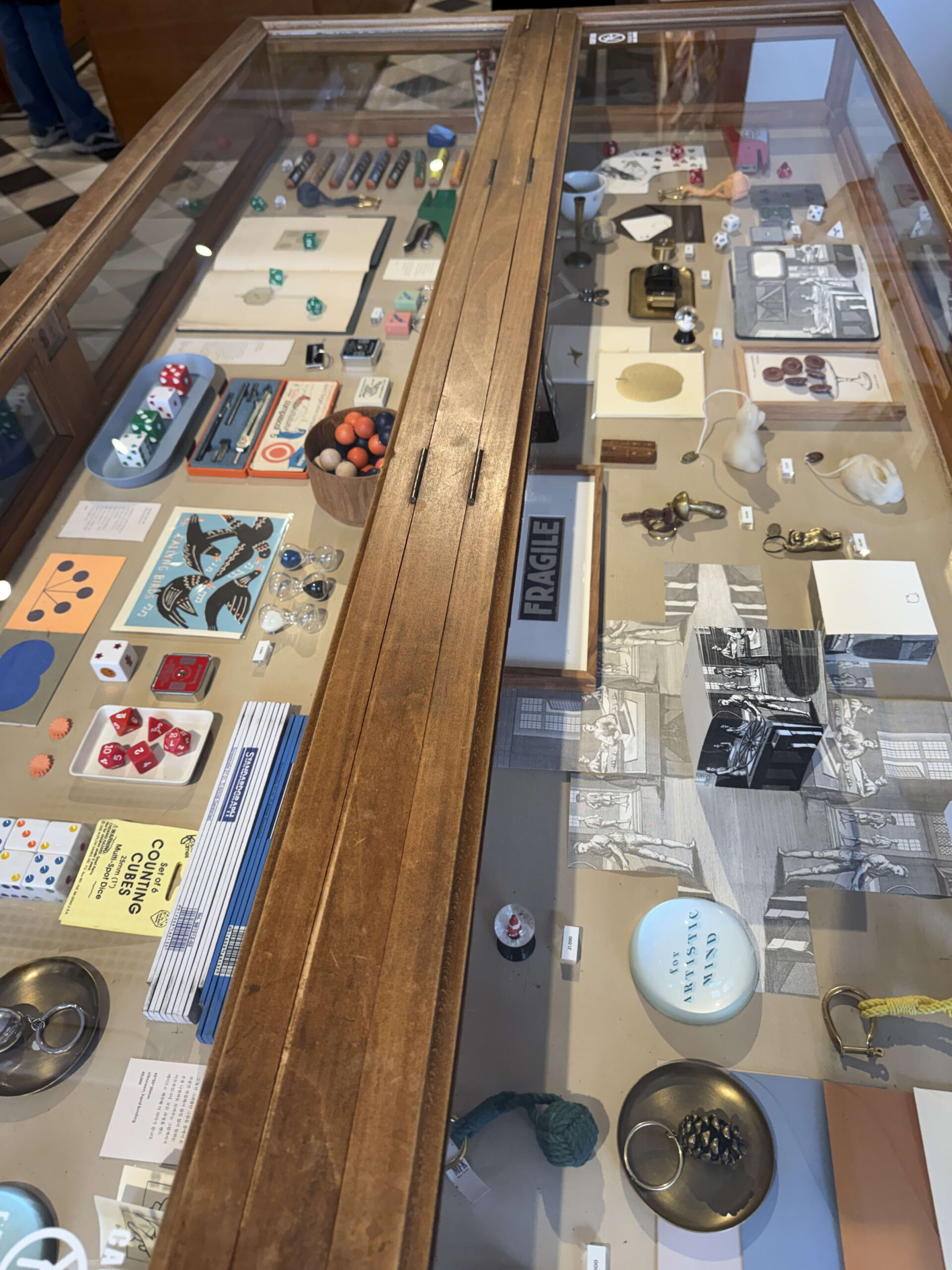 Vintage stationery in a wooden glass case
