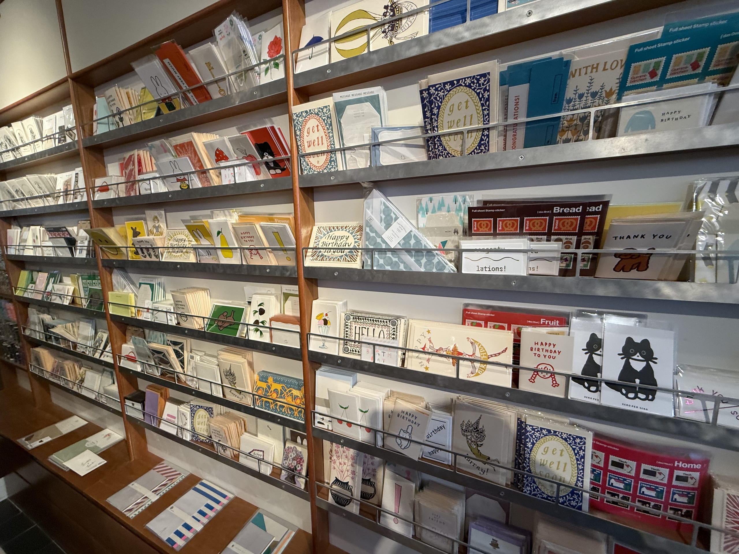Cards on shelves at Point of View, Seoul.