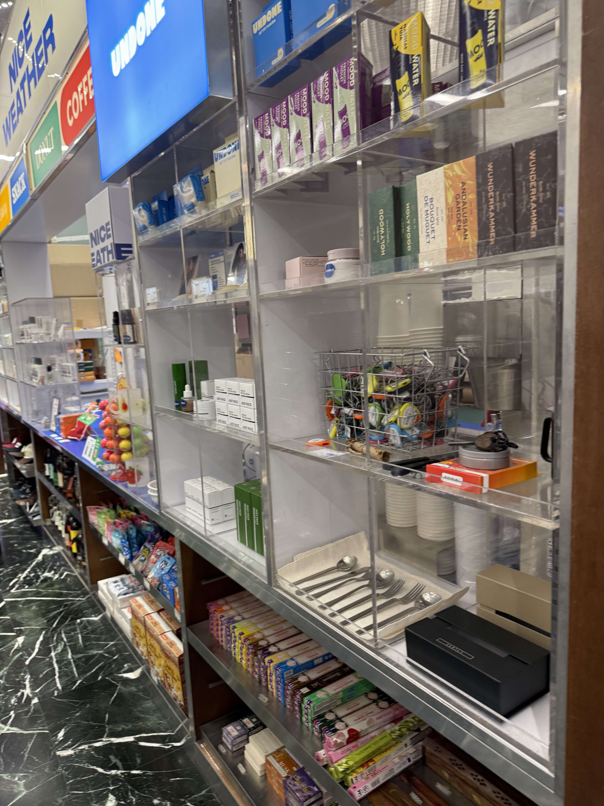Clear shelves with sundries and snacks in Seoul.