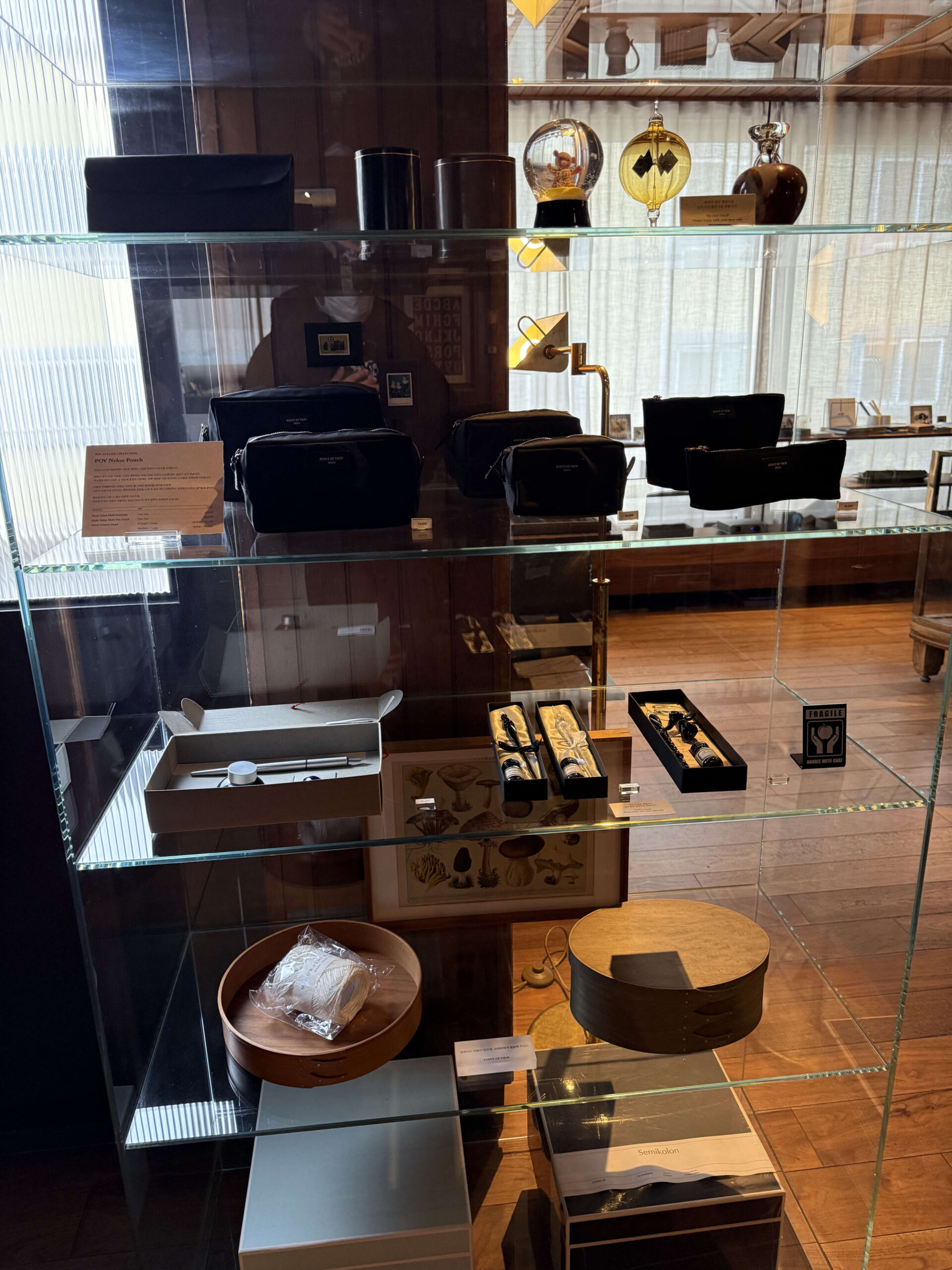 Glass case displaying stationery.