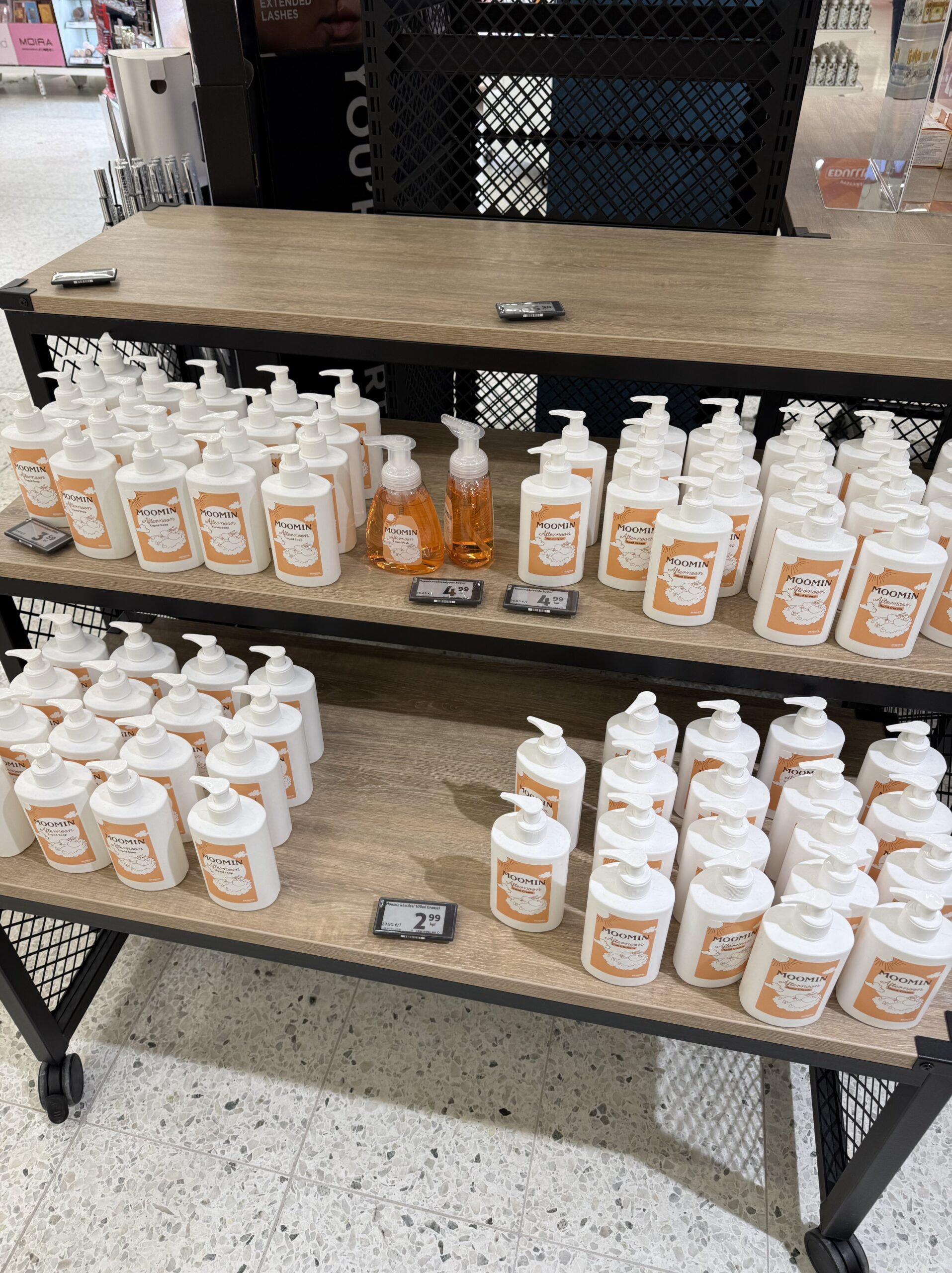 Moomin skincare bottles lined up on a shelf