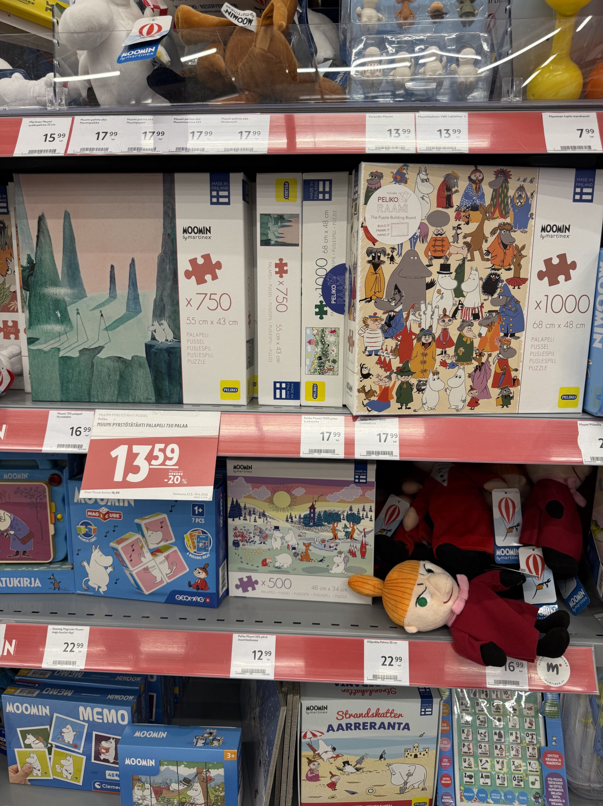 Moomin jigsaw puzzles on a shelf