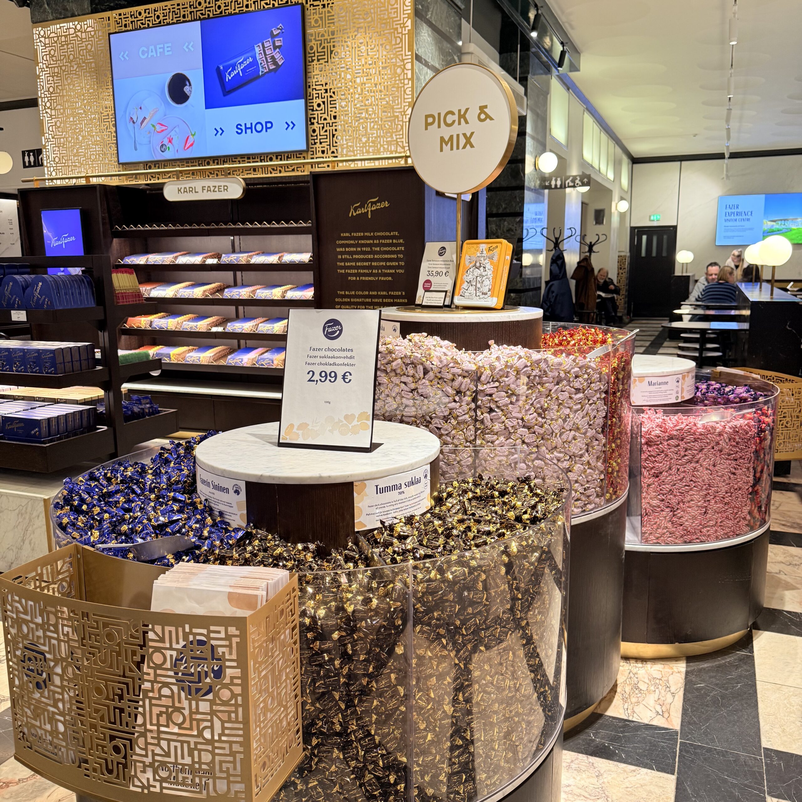 Pick and mix case with a €2.99 per 100g sign