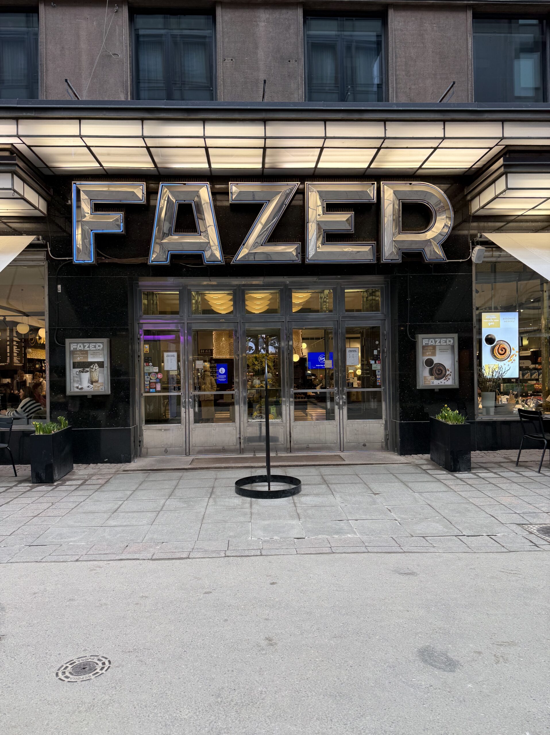 Exterior and black granite facade of Fazer Cafe Helsinki
