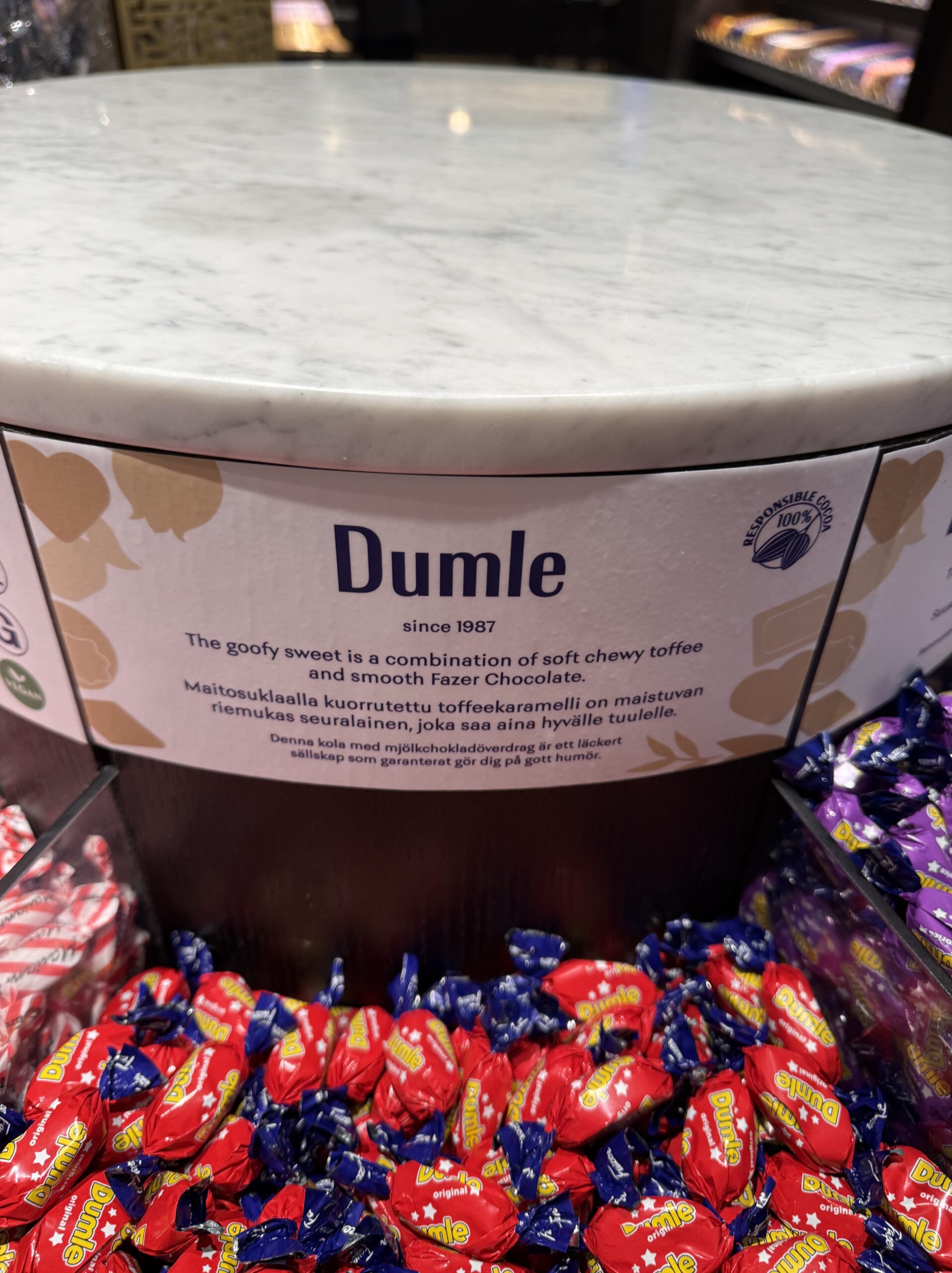 Dumle chocolates in red and blue packaging
