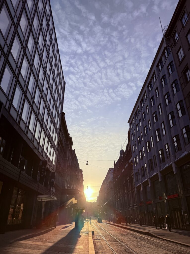 Sunset view over Aleksanterinkatu street in Helsinki with cirrocumulus clouds