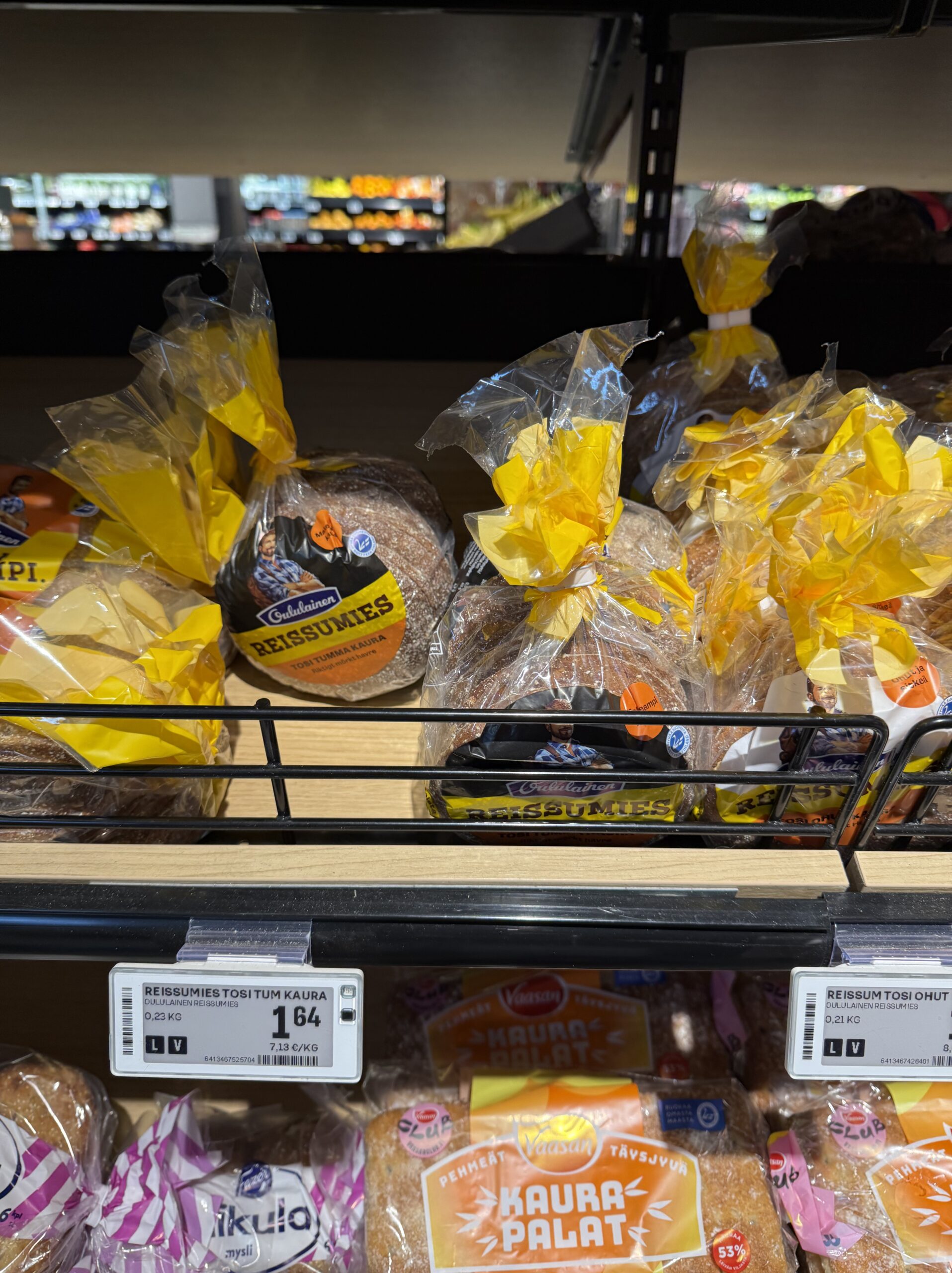 Shelves displaying rye breads like Oululainen's Reissumies