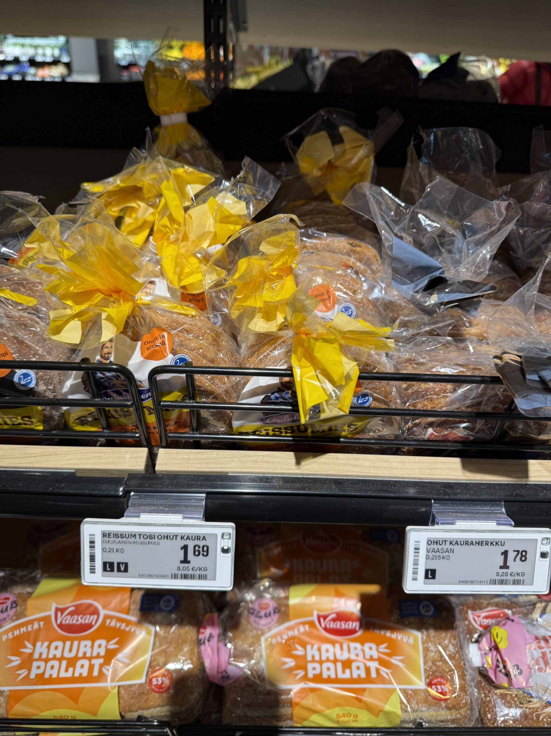 Shelves packed with rustic rye and oat breads