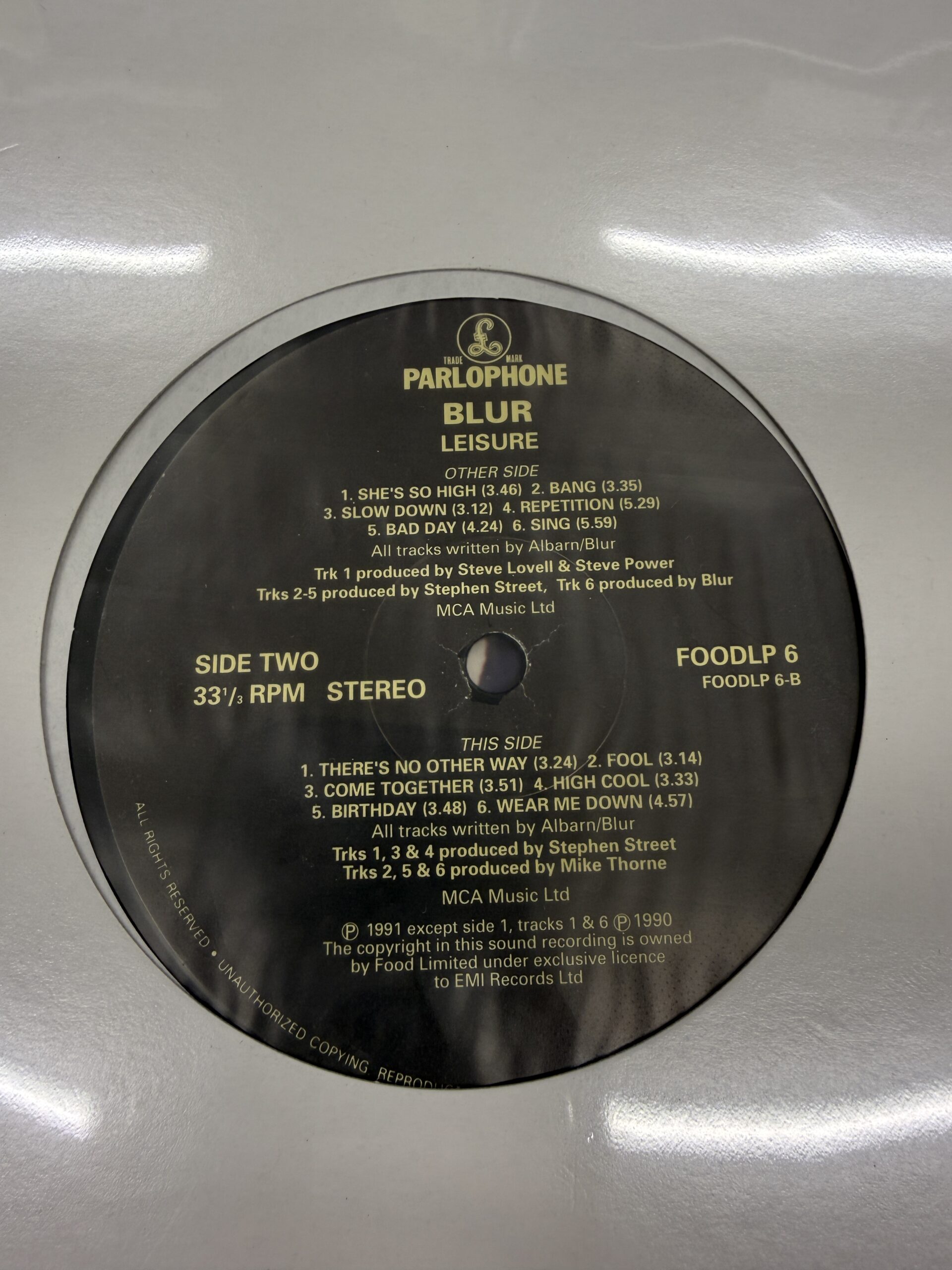 Black center label of Blur's Leisure vinyl
