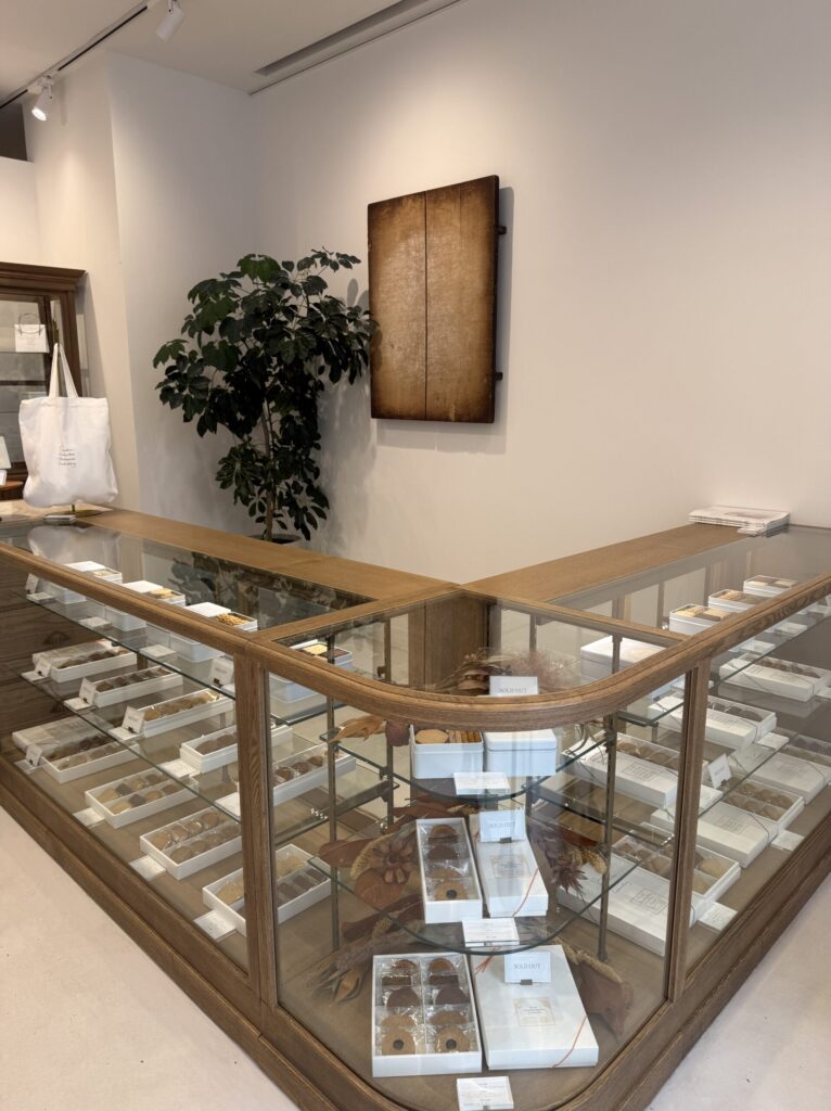 Antique-style wooden showcase displaying premium biscuits