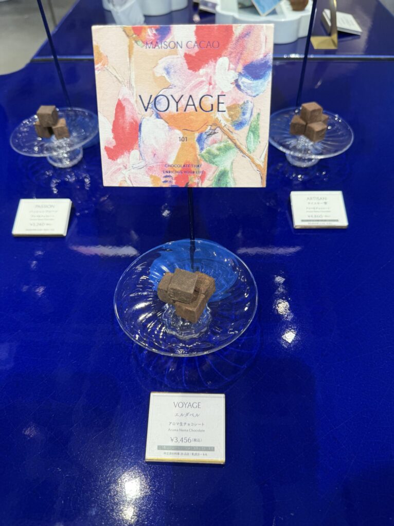 Glass dishes displaying raw chocolate flavors with watercolor cards