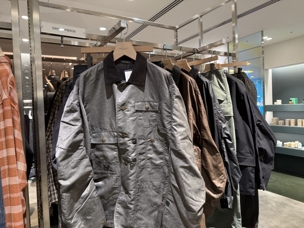 DAIWA PIER39 grey field jacket on a rack