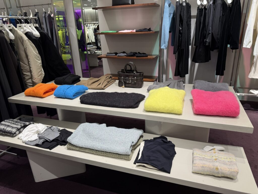 Vibrant womens mohair knits on a white table