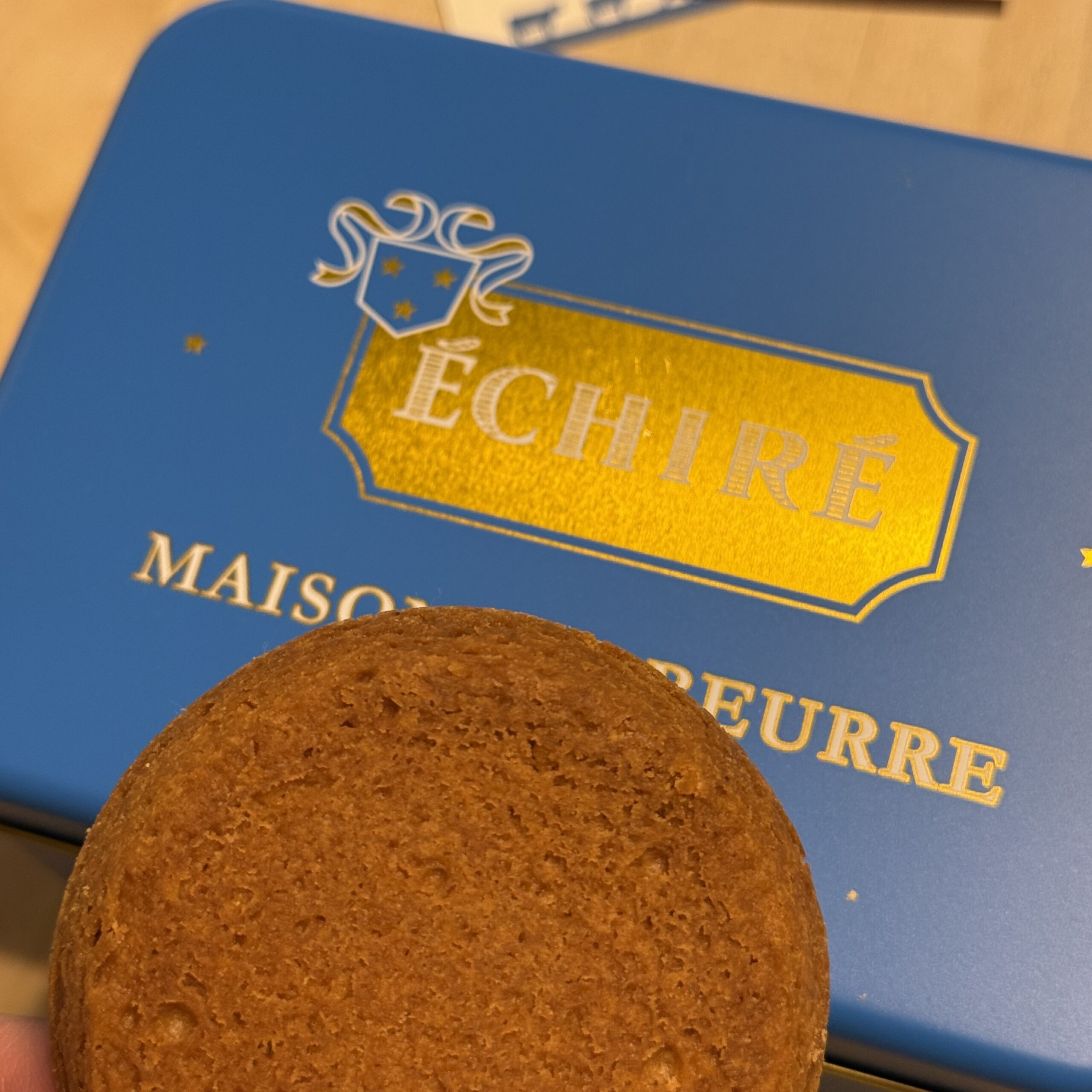 A baked galette and a blue Échiré tin.