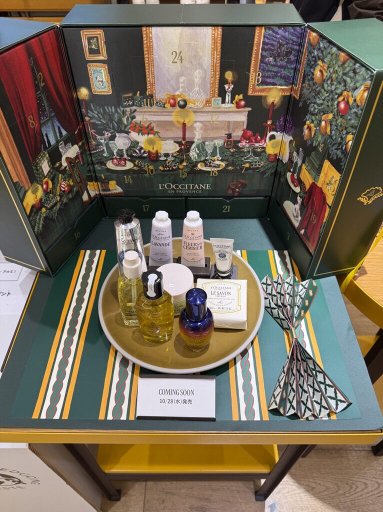 The L'OCCITANE premium advent calendar with a Coming Soon sign indicating the October 28 release date.