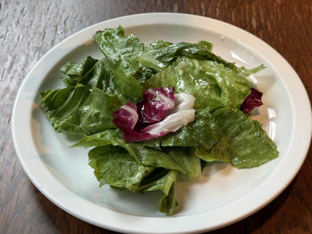 Fresh green salad with radicchio served at A16 TOKYO